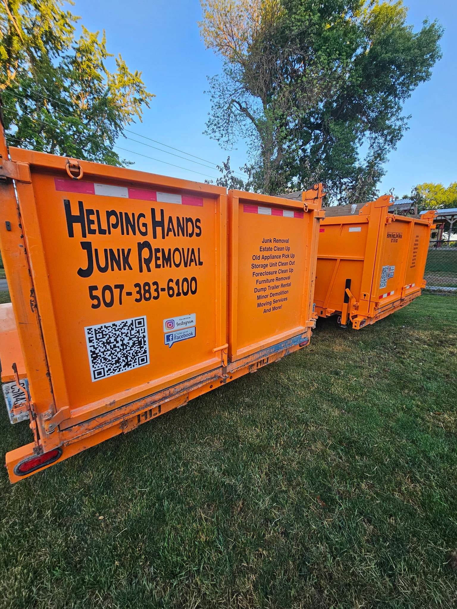 Helping Hands Junk Removal orange dumpster with service list
